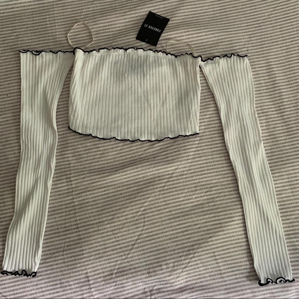 white tight fitting crop top w long sleeves